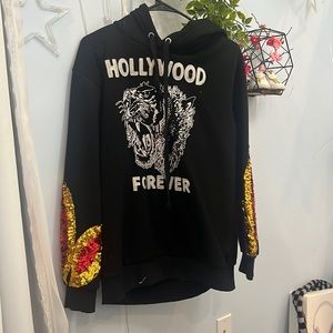 Black designed with fire on the sleeves hoodie